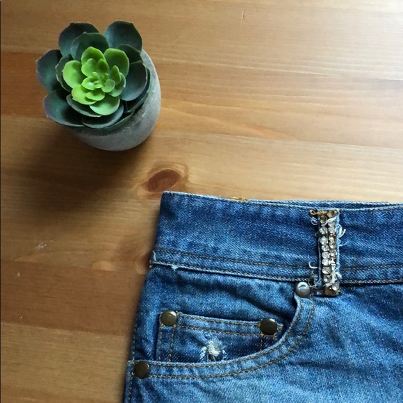 Lagaci Sport • bedazzled mini jean skirt with distressed look - Picture 3 of 7